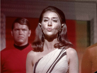 Illustration for article titled Rare Star Trek photos show green Orion slavegirls like you've never seen them